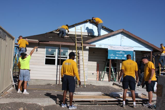 http://upload.wikimedia.org/wikipedia/commons/1/1a/US_Navy_111026-N-NT881-027_San_Antonio_area_sailors_volunteer_to_help_build_a_house_for_Habitat_for_Humanity.jpg